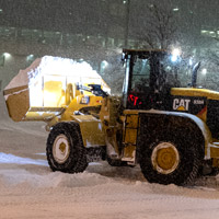 Chargement de la neige dans la région de Laval et Montréal.